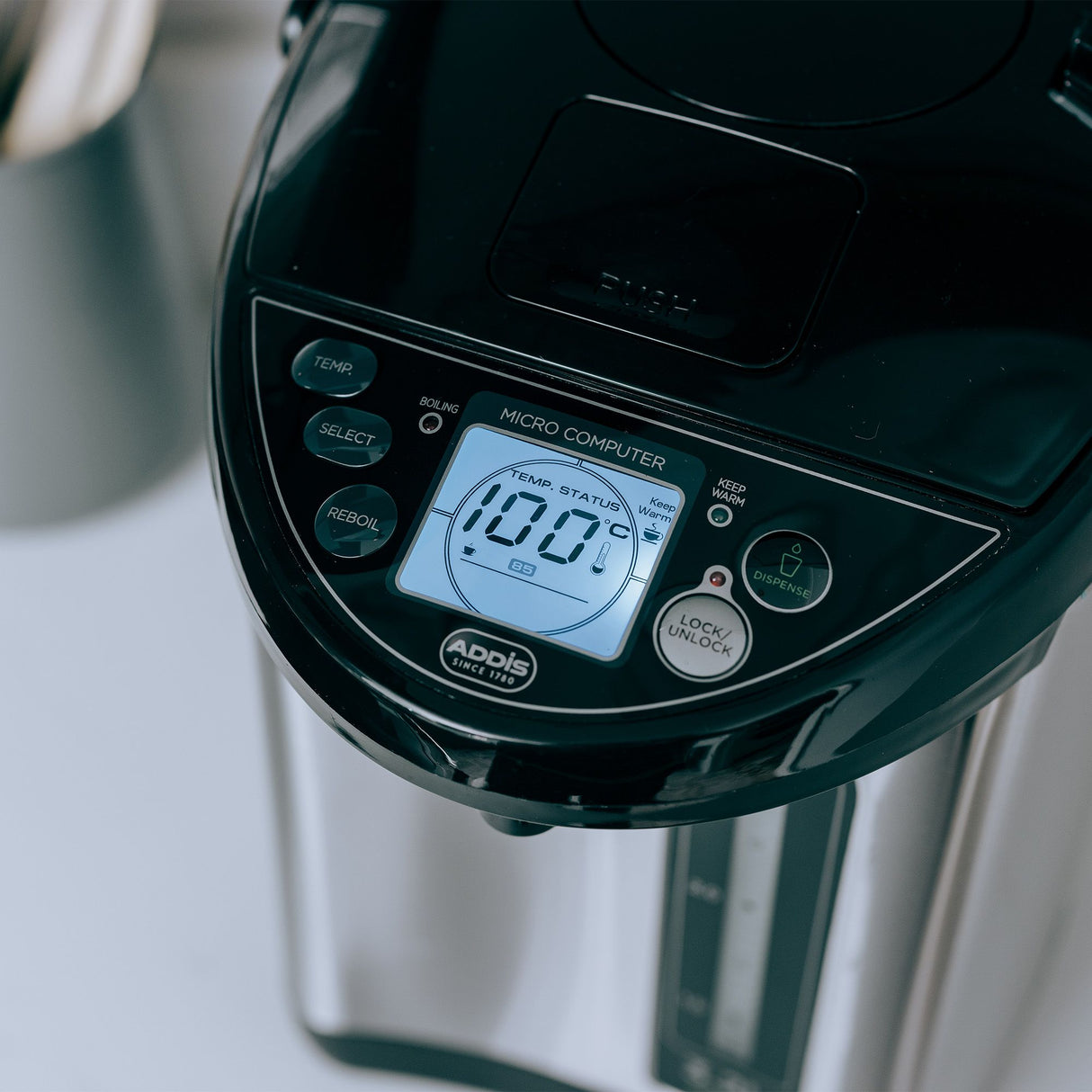 Digital display on thermo pot showing temperature setting.