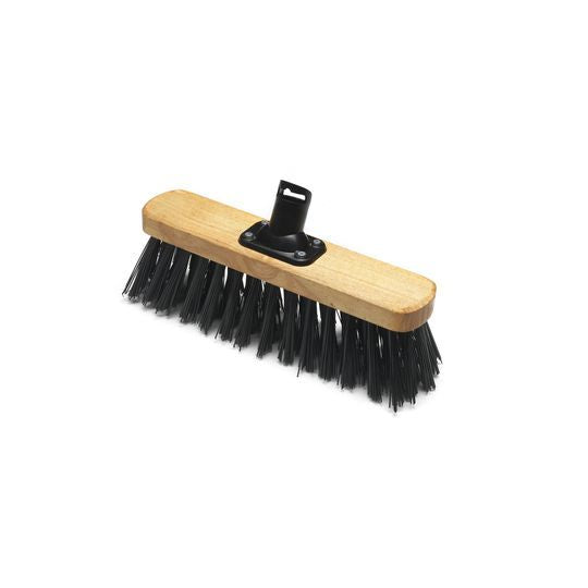 A stiff broom head with black bristles and a wooden body.