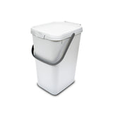 A white utility caddy with a lid and a handle, suitable for storing cleaning supplies or composting food waste.