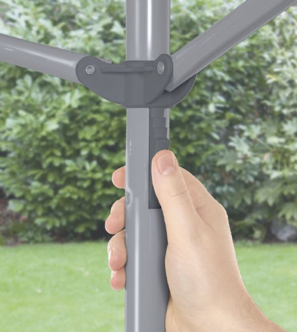Thumb pushing the height adjustment below the arms, top of the pole